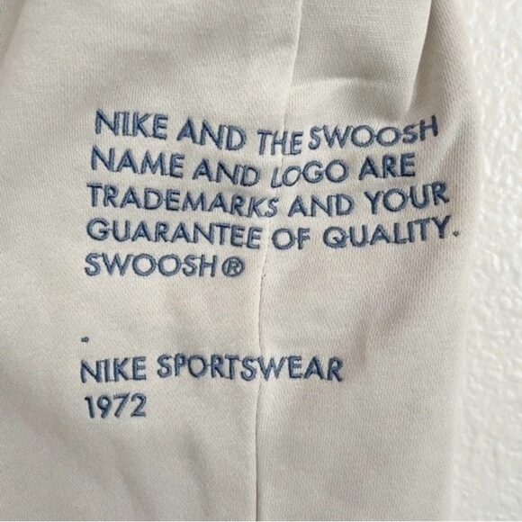 Nike Kids Cream Joggers with Red Swoosh and Blue Lettering - Picture 2 of 3